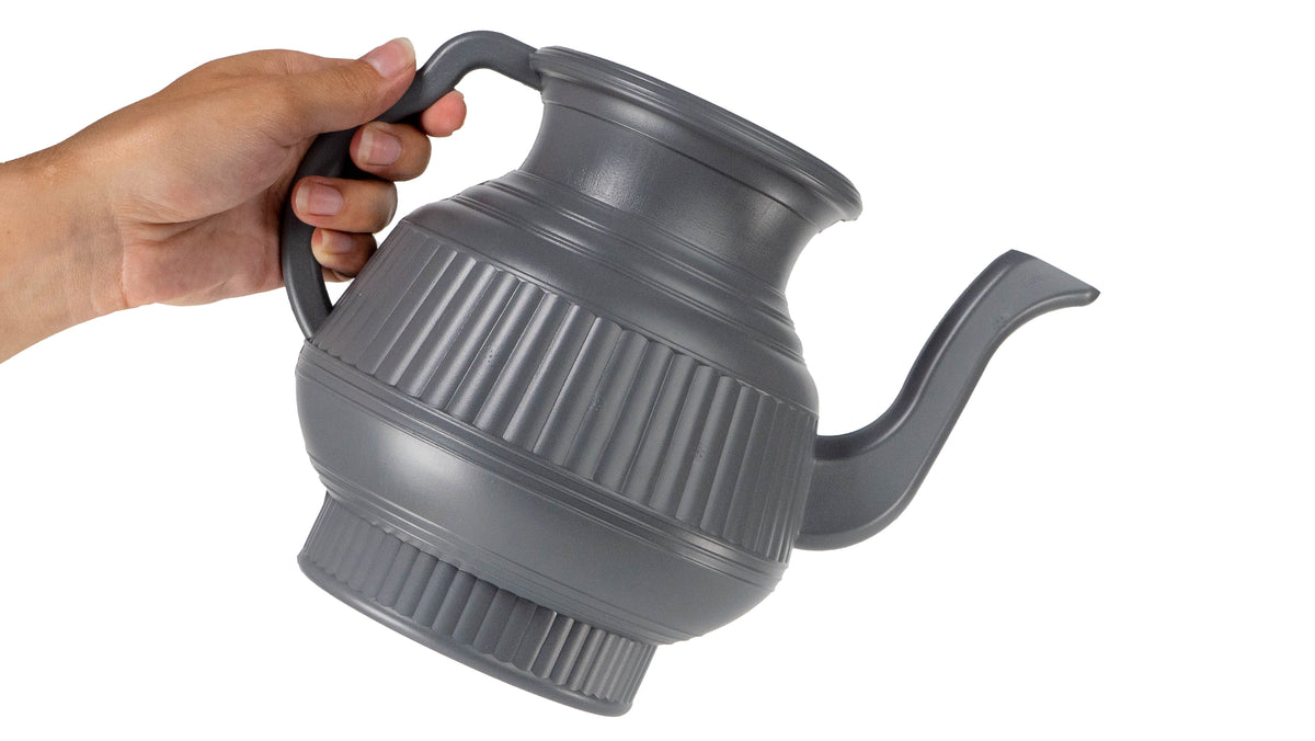 Gray 2.25L Lota and Bodna toilet wash jug held by the handle